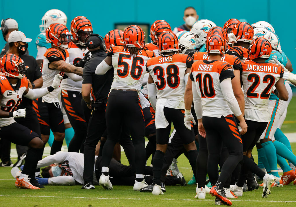 <p><b><i>Bengals 7</i></b><br />
<b><i>Dolphins 19</i></b></p>
<p>So let me get this straight: Mike Thomas delivers not one, but two vicious and unnecessary hits on Jakeem Grant yet isn&#8217;t among the five players ejected for the ensuing dust up? What in the name of Tim Donaghy is that?</p>
<p>But Miami may have won in more ways than one. Dolphins players saw how <a href="https://www.nfl.com/news/brian-flores-defends-dolphins-players-stresses-need-for-better-poise-after-brawl">Brian Flores wanted all the smoke</a> — just the type of sequence that galvanizes a team for an unexpected playoff run.</p>
