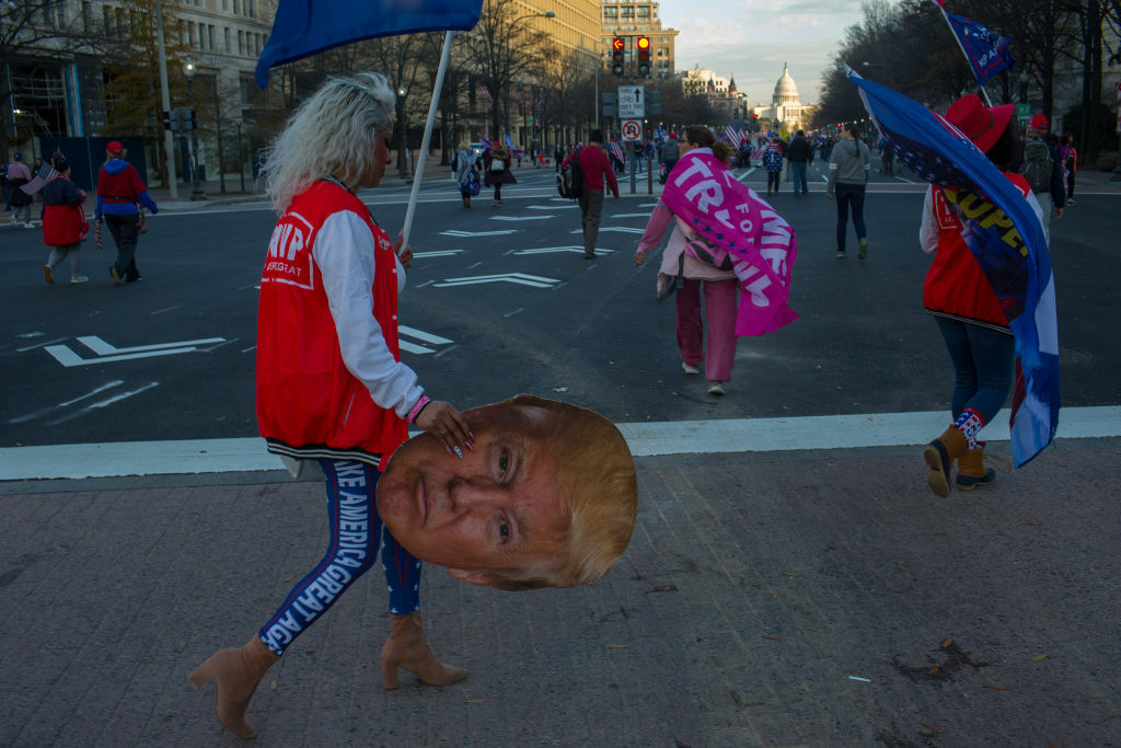 WASHINGTON, D.C. - DECEMBER 12: US President Donald Trump supporters demonstrating against the election results march to the Supreme Court to protest against the Court's decision not to overturn the election,  on December 12, 2020 in Washington, D.C. Thousands of protesters who refuse to accept that President-elect Joe Biden won the election are rallying ahead of the electoral college vote to make Trump’s 306-to-232 loss official. (Photo by Andrew Lichtenstein/Corbis via Getty Images)