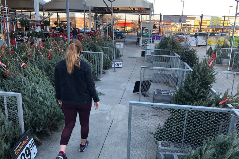 Customers walk in the bare Christmas tree section at a Home Depot store in northern Virginia Monday afternoon. 