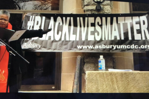 New Black Lives Matter banner raised at DC church vandalized after pro-Trump protest