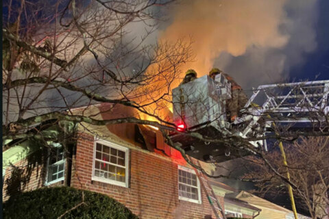 Firefighters battle Silver Spring house fire