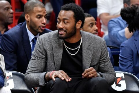 Former Wizards All-Star John Wall attends Mystics game against LA Sparks
