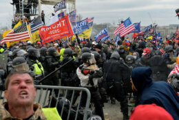 Trump supporters clash with police and security forces as people try to storm the US Capitol Building in Washington, DC, on January 6, 2021. - Demonstrators breeched security and entered the Capitol as Congress debated the a 2020 presidential election Electoral Vote Certification. (Photo by Joseph Prezioso / AFP) (Photo by JOSEPH PREZIOSO/AFP via Getty Images)