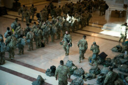 Military police prepare to deploy across U.S. Capitol grounds after their arrival in Washington from across the region on Jan. 13, 2021. More than 20,000 armed guardsmen are expected to provide security in the nation's capital amid threats against the inauguration of President-elect Joe Biden. (WTOP/Alejandro Alvarez)