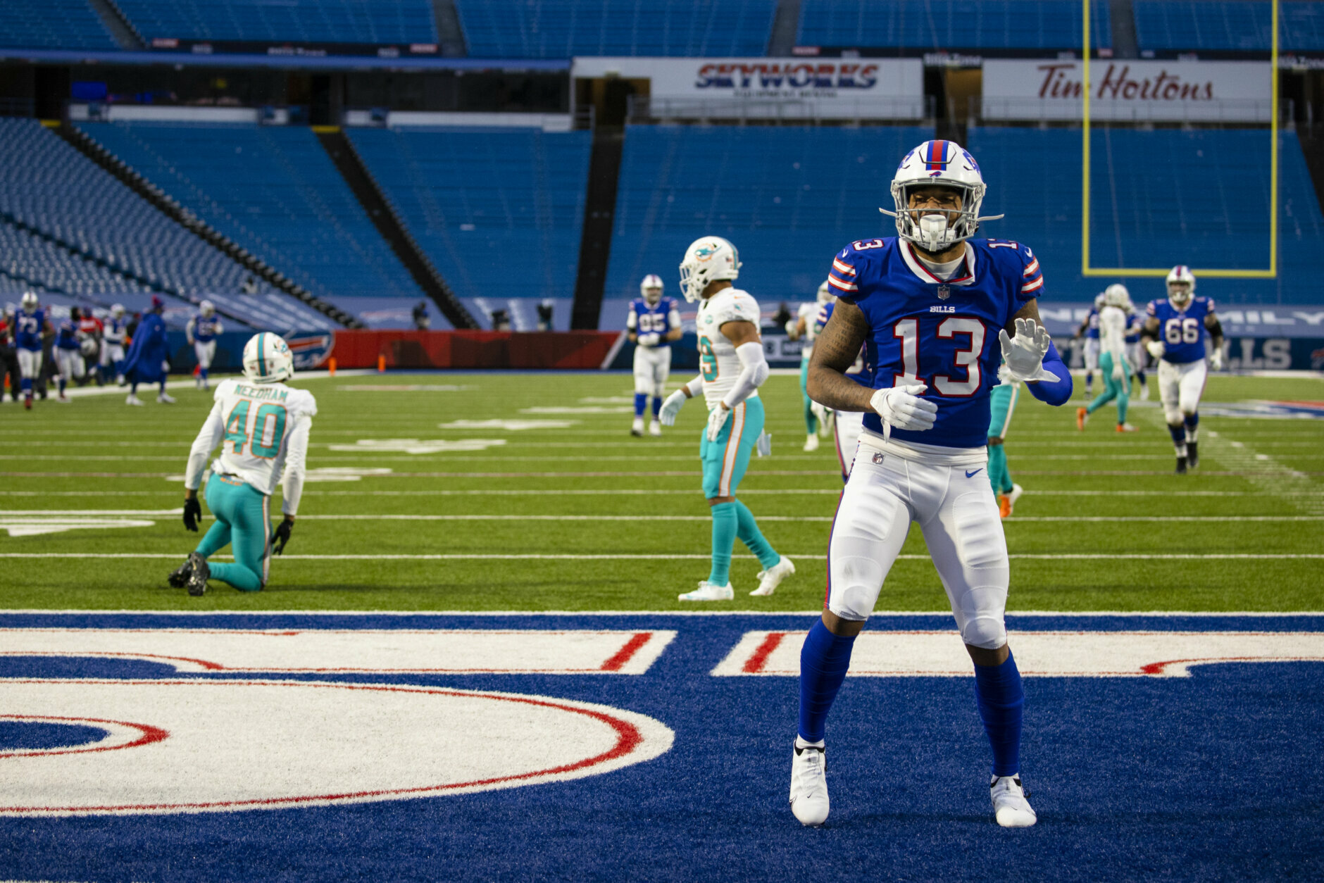 <p><b><i>Dolphins 26</i></b><br />
<b><i>Bills 56</i></b></p>
<p>Still don&#8217;t think Buffalo is for real? Against a division opponent playing for its season, the Bills had their second-highest scoring output in franchise history against the league&#8217;s top scoring defense. Their six straight double-digit wins to close out the regular season <a href="https://twitter.com/ESPNStatsInfo/status/1345859986484768769?s=20" target="_blank" rel="noopener">put them in some elite company</a>. This feels like a team of destiny.</p>
<p>Even though Miami <a href="https://twitter.com/ESPNStatsInfo/status/1345848891657375745?s=20" target="_blank" rel="noopener">made the wrong kind of history in this loss</a>, the Dolphins have no reason to hang their heads. Going 10-6 in the second year of a massive rebuild is a big leap forward, and they&#8217;ll have the third and 18th overall picks in the draft to further bolster an already-solid roster. It looks like this Fins-Bills rivalry will define the AFC East for years to come — a refreshing change after New England&#8217;s decades of domination.</p>
