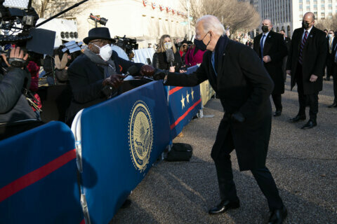 Al Roker gets a fist bump from Biden