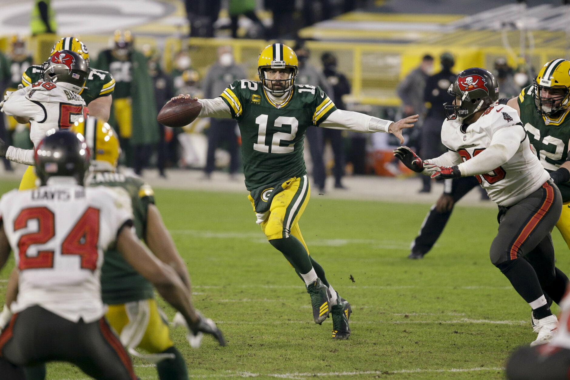 <p><b><i>Bucs 31</i></b><br />
<b><i>Packers 26</i></b></p>
<p>Green Bay blew it.</p>
<p><a href="https://profootballtalk.nbcsports.com/2021/01/24/aaron-rodgers-says-there-are-a-lot-of-uncertain-futures-myself-included/">In what might be Aaron Rodgers&#8217; final act as the Packers QB</a>, he should have run in a potential game-tying touchdown &#8230;</p>
<blockquote class="twitter-tweet">
<p dir="ltr" lang="en">Rodgers blew it. This is a touchdown if he runs. <a href="https://t.co/KPOlH1sXFz">pic.twitter.com/KPOlH1sXFz</a></p>
<p>— Michael David Smith (@MichaelDavSmith) <a href="https://twitter.com/MichaelDavSmith/status/1353478355895676928?ref_src=twsrc%5Etfw">January 24, 2021</a></p></blockquote>
<p><script async src="https://platform.twitter.com/widgets.js" charset="utf-8"></script></p>
<p>&#8230; and Matt LaFleur committed coaching malpractice by taking a meaningless field goal rather than giving his legendary QB another chance to get in the end zone on a goal-to-go situation. The Packers will be haunted by that, and the inability to cash in any of Tom Brady&#8217;s three interceptions for points that could have rendered that entire late-game disaster moot.</p>
<p>But give it up for Bruce Arians and the GOAT. <a href="https://wtop.com/nfl/2021/01/trio-of-black-assistants-make-history-as-bucs-coordinators/" target="_blank" rel="noopener">Arians&#8217; commitment to diversity</a> has paid off big dividends, and Brady&#8217;s legend now includes the first case of home-field advantage in the Super Bowl in what is his 10th appearance on football&#8217;s biggest stage. Hopefully, more will be made about finally giving minority coaches their due than rehashing Brady&#8217;s obvious status as the most decorated player in NFL history.</p>
