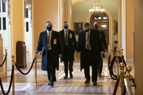 The Latest: No public access to Capitol grounds Jan. 20