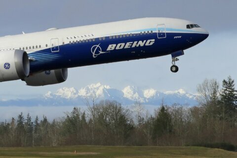 Boeing says 2 directors are leaving as board faces scrutiny