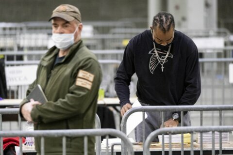 EXPLAINER: How Warnock won 1 of Georgia’s 2 Senate runoffs