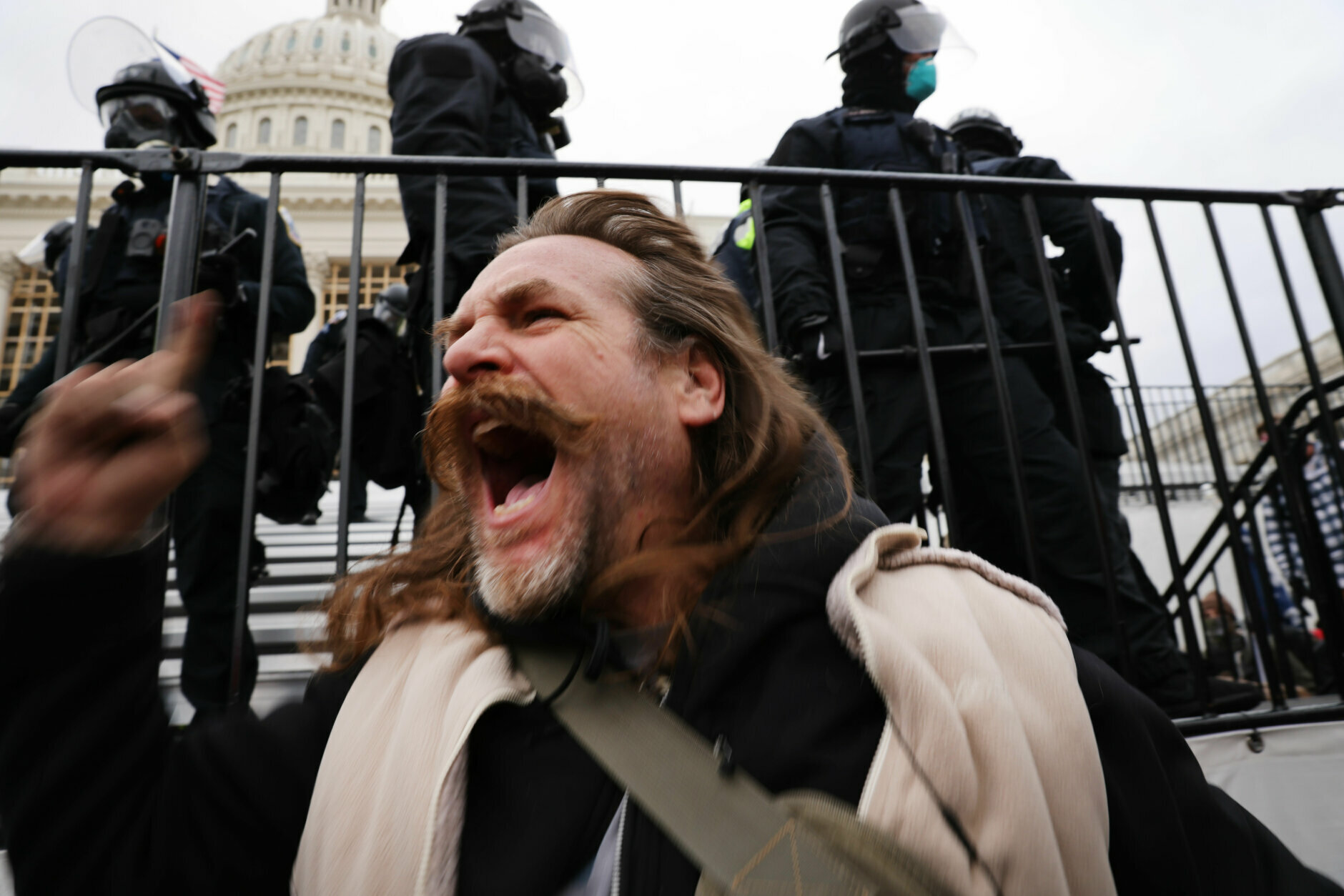 WASHINGTON, DC - JANUARY 06: Trump supporters gather outside the U.S. Capitol building following a "Stop the Steal" rally on January 06, 2021 in Washington, DC. A pro-Trump mob stormed the Capitol earlier, breaking windows and clashing with police officers. Trump supporters gathered in the nation's capital to protest the ratification of President-elect Joe Biden's Electoral College victory over President Donald Trump in the 2020 election. (Photo by Spencer Platt/Getty Images)