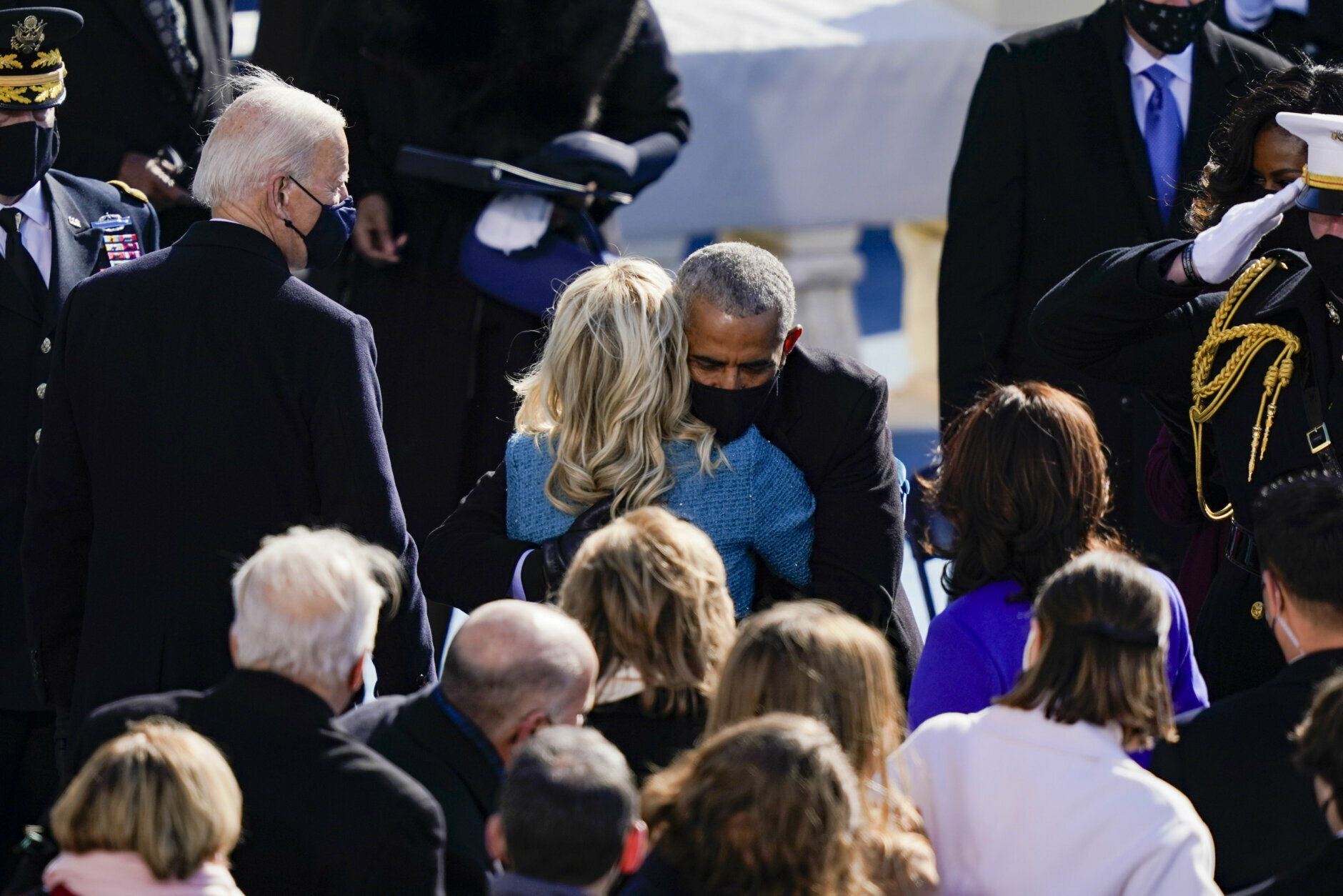 WASHINGTON, DC - JANUARY 20: Former president Barack Obama hugs First Lady Dr. Jill Biden during the inauguration of U.S. President Joe Biden on the West Front of the U.S. Capitol on January 20, 2021 in Washington, DC.  During today's inauguration ceremony Joe Biden becomes the 46th president of the United States. (Photo by Drew Angerer/Getty Images)