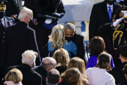 WASHINGTON, DC - JANUARY 20: Former president Barack Obama hugs First Lady Dr. Jill Biden during the inauguration of U.S. President Joe Biden on the West Front of the U.S. Capitol on January 20, 2021 in Washington, DC.  During today's inauguration ceremony Joe Biden becomes the 46th president of the United States. (Photo by Drew Angerer/Getty Images)