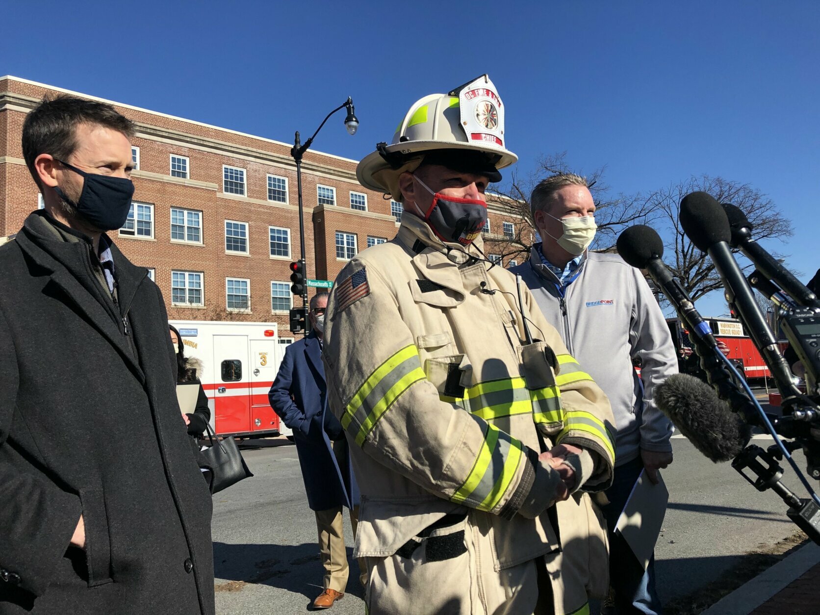 DC Fire Chief John Donnelly (center) addresses the media at the Bridgepoint explosion scene on Jan. 28, 2021. 