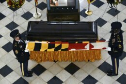 The Maryland National Guard Honor Guard holds the Maryland flag on the casket of Maryland Senate President Emeritus Thomas V. Mike Miller under the dome of the State House in Annapolis, Md., Thursday, Jan. 21, 2021. (Kim Hairston/The Baltimore Sun via AP, Pool)