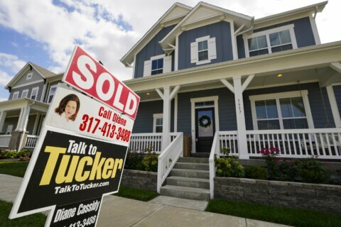 US long-term mortgage rates slip; 30-year loan at 2.77%