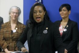 FILE - Jan. 22, 2019 file photo, Del. Jennifer Carroll Foy, D-Prince William, center, speaks during a news conference of ERA (Equal Rights Amendment) supporters after her ERA bill was killed by a House subcommittee inside the Pocahontas Building in Richmond, Va. An unusually broad field is vying to be the next governor of Virginia as the marquee political contest of 2021 gets into full swing.    (Bob Brown/Richmond Times-Dispatch via AP)