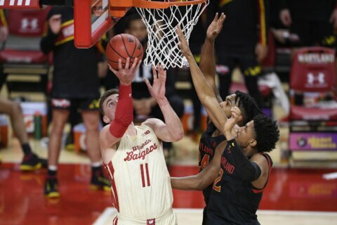 No. 14 Wisconsin weathers Maryland comeback in 61-55 win