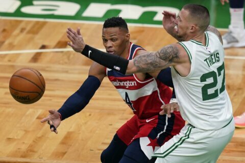 Tatum has 32 to help Celtics hold off Beal, Wizards 116-107