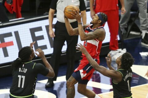 Beal leads Wizards, minus Westbrook, past Wolves for 1st win