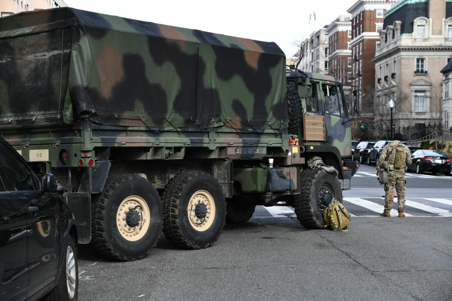 <p>A military vehicle sits in the streets of D.C. on Sunday.</p>
