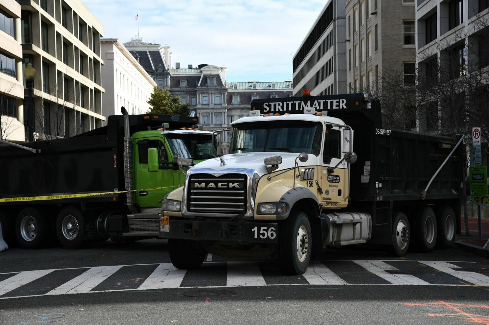 <p>D.C. streets are blocked by Mack Trucks, as well as fencing.</p>
