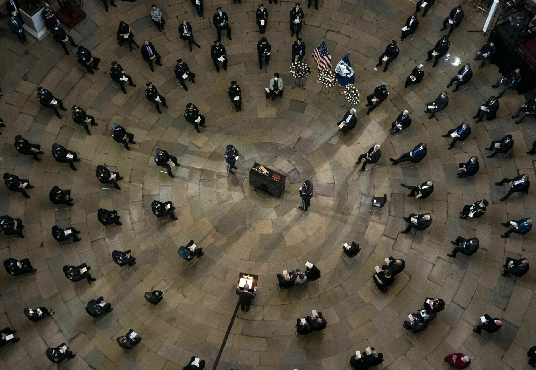 Senate Majority Leader Chuck Schumer of N.Y., speaks during a ceremony memorializing U.S. Capitol Police officer Brian Sicknick, as an urn with his cremated remains lies in honor on a black-draped table at the center of the Capitol Rotunda, Wednesday, Feb. 3, 2021, in Washington. (Kevin Dietsch/Pool via AP)