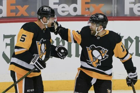 Rust scores twice, Penguins pull away from Capitals 6-3