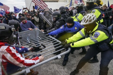 Man charged in US Capitol riot worked for FBI, lawyer says