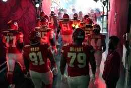 The Kansas City Chiefs run onto the field before the NFL Super Bowl 55 football game between the Kansas City Chiefs and Tampa Bay Buccaneers, Sunday, Feb. 7, 2021, in Tampa, Fla. (AP Photo/David J. Phillip)