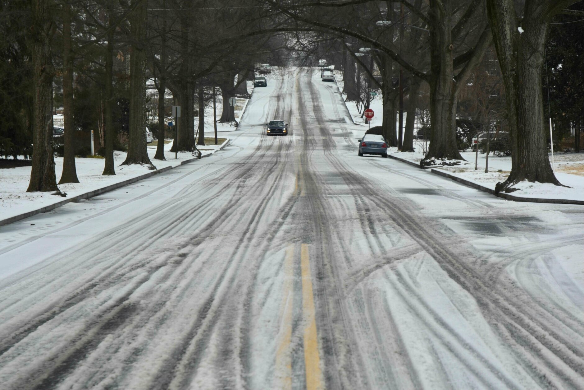 A roadway in the D.C. area covered in snow after a winter storm on Feb. 18, 2021.