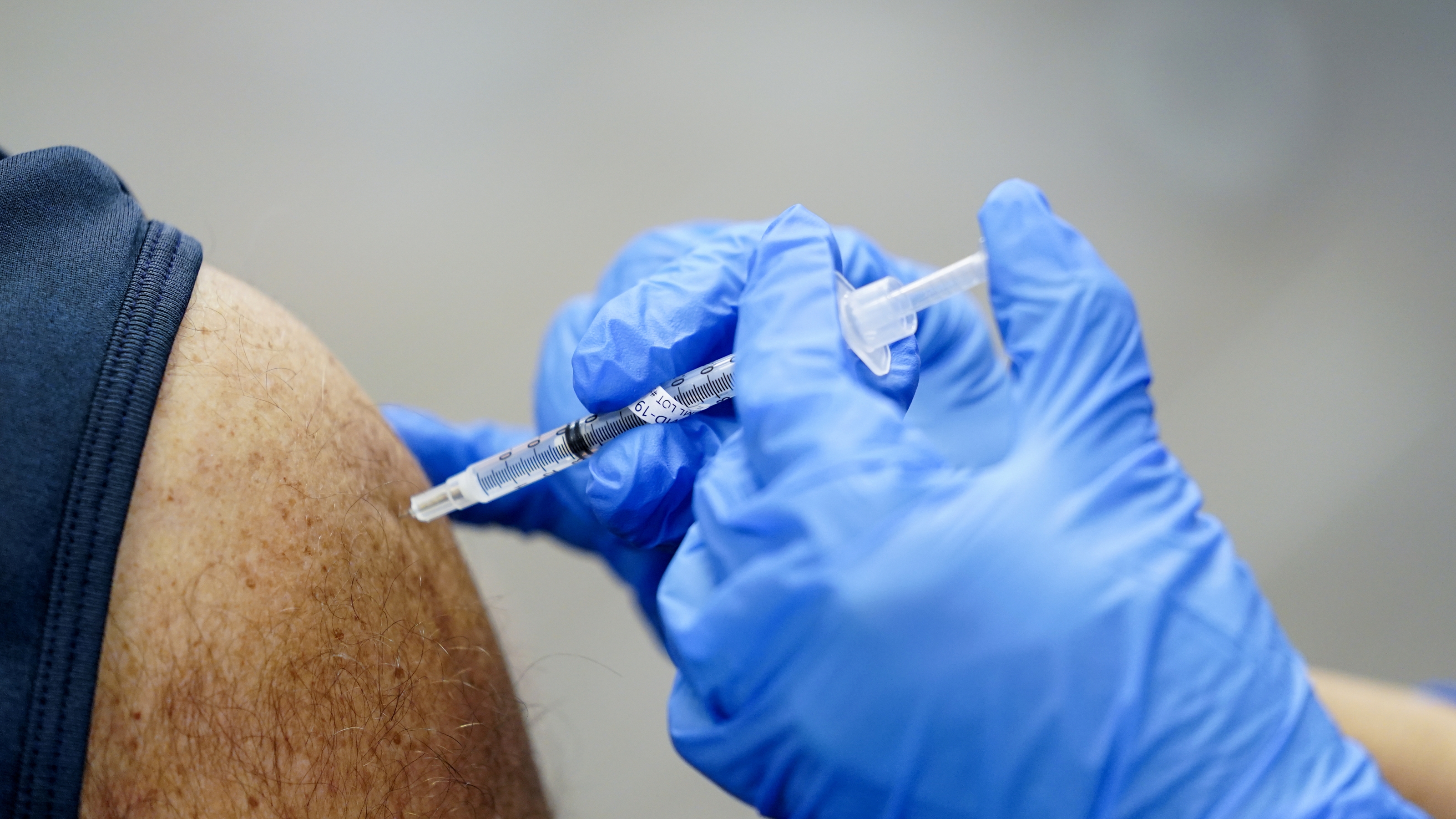 ‘Chaos and confusion’ at the vaccine launch raises the question: What is fair?