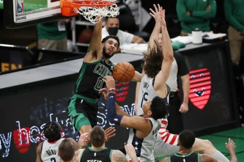 Tatum scores 31, rallies Celtics past Wizards 111-110