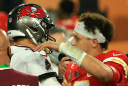 TAMPA, FLORIDA - FEBRUARY 07: Tom Brady #12 of the Tampa Bay Buccaneers and Patrick Mahomes #15 of the Kansas City Chiefs speak after Super Bowl LV at Raymond James Stadium on February 07, 2021 in Tampa, Florida. The Buccaneers defeated the Chiefs 31-9.
 (Photo by Mike Ehrmann/Getty Images)