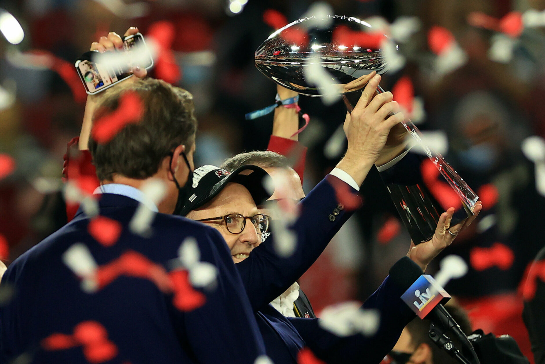 TAMPA, FLORIDA - FEBRUARY 07: Tampa Bay Buccaneers owner Joel Glazer holds the Lombardi Trophy after defeating the Kansas City Chiefs in Super Bowl LV at Raymond James Stadium on February 07, 2021 in Tampa, Florida. The Buccaneers defeated the Chiefs 31-9. (Photo by Mike Ehrmann/Getty Images)