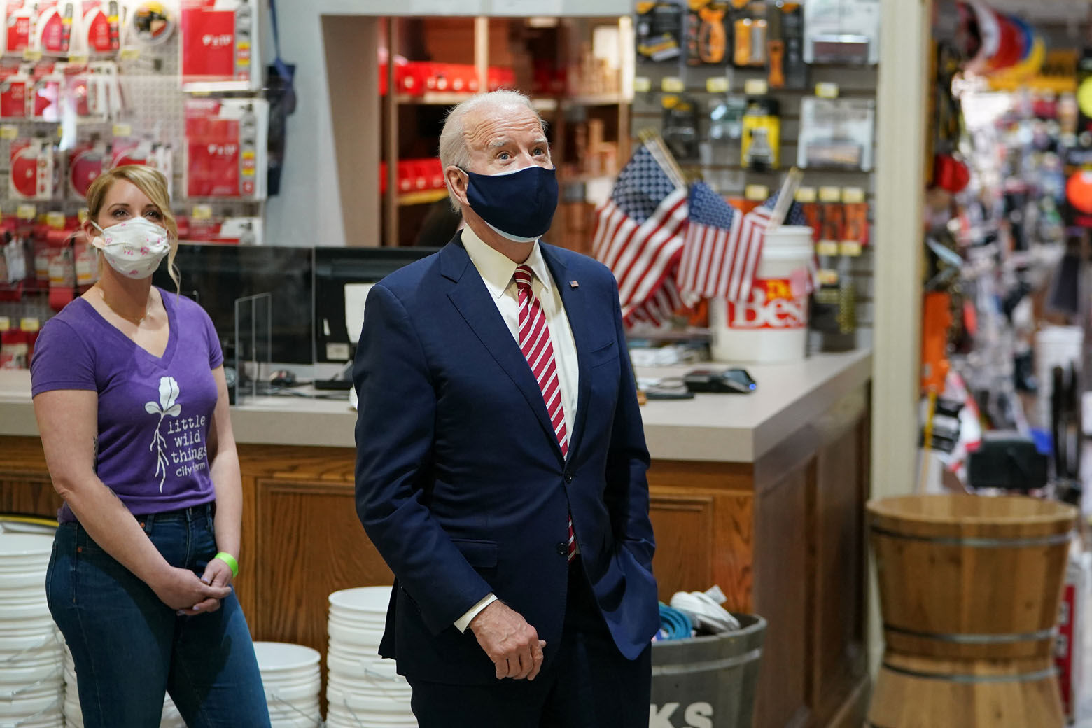 <p>US President Joe Biden stands with Mary Anna Ackley (L), owner of Little Wild Things Farm, a business next door to Jenks &amp; Son, both benefiting from the PPP loan, as he visits inside W.S. Jenks &amp; Son, a hardware store in Washington, DC, on March 9, 2021.</p>

