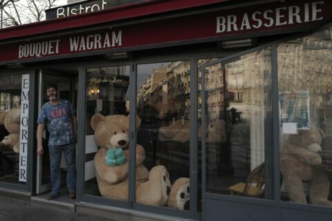 AP PHOTOS:  Bookseller keeps Paris plush with teddy bears