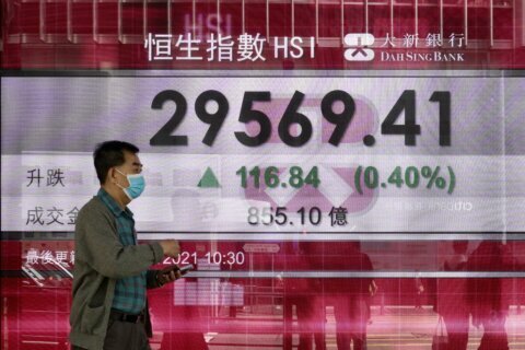 Asian shares advance despite Wall Street retreat