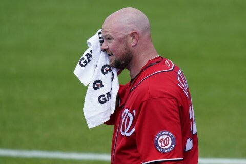 Less than 2 weeks post-surgery, Lester makes Nationals debut