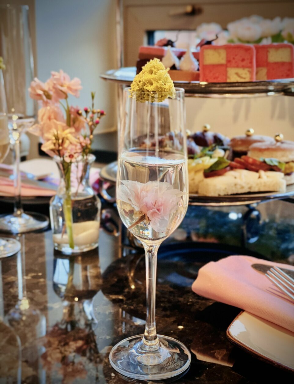 <p><strong>Fairmont Washington D.C. Georgetown&#8217;s sakura and peach blossom gelee</strong>: The Fairmont Georgetown is offering a <a href="http://fairmontwashington.eventbrite.com/" target="_blank" rel="noopener">cherry blossom-themed afternoon tea</a> on weekends from March 27 to April 25. The menu has a mix of sweet and savory fare for the season, and this cocktail is a standout, combining pickled cherry blossoms with peach blossom sake. Space is limited for the afternoon tea ($52-$85), so now&#8217;s the time to score that reservation.</p>
