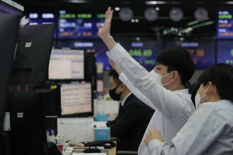 Shares slip in Asia after bond yield spike hits Wall St