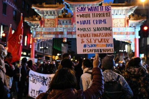 Activists respond to Atlanta-area killings with late-night rally in Chinatown