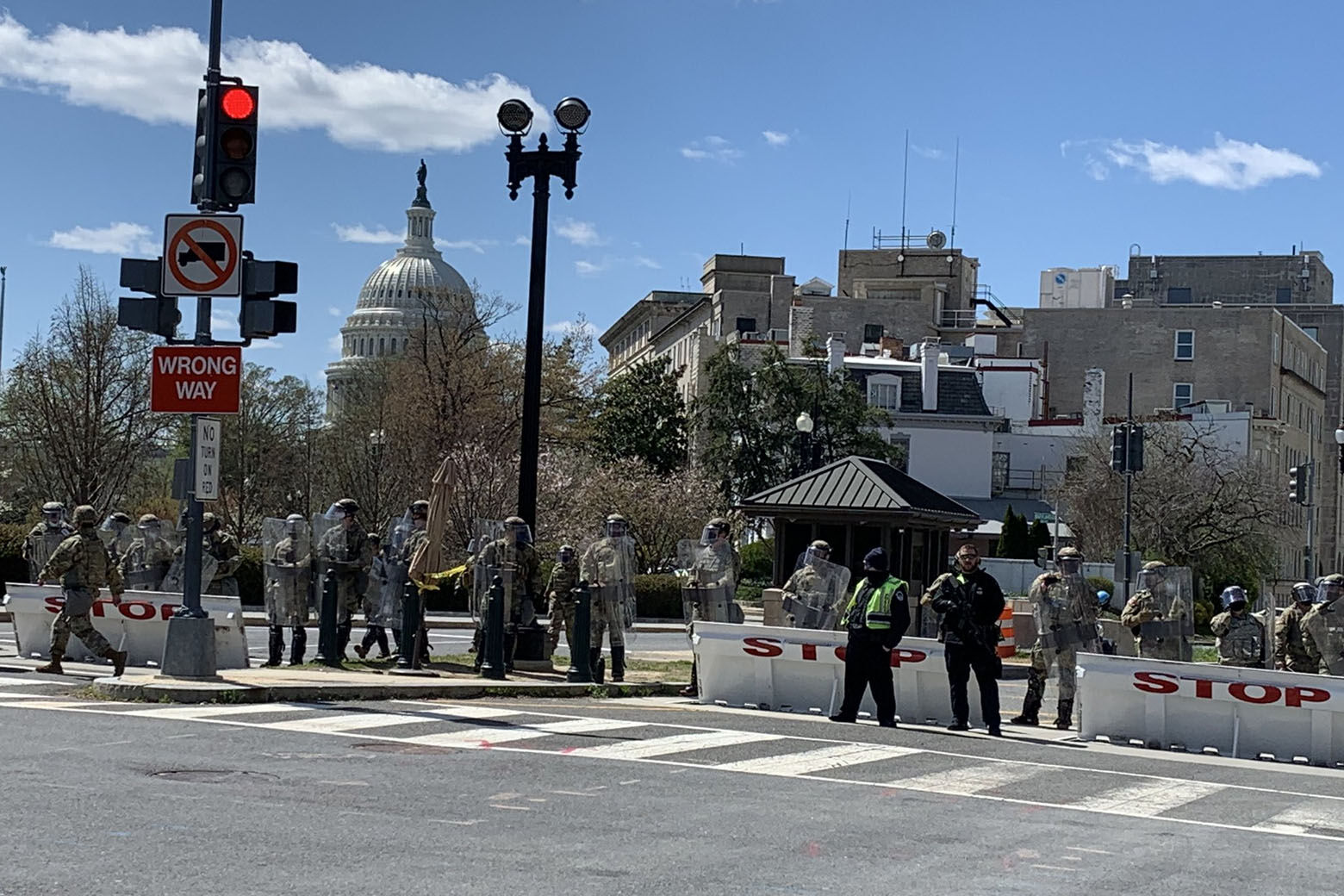 National Guard members with riot shields block off Second Street NE near the U.S. Capitol on April 2, 2021. (WTOP/Mike Murillo)