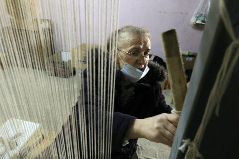Training opens ‘a window of hope’ for Albanian rug-weavers
