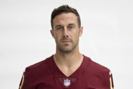 FILE - This is a 2020 file photo showing Alex Smith of the Washington NFL football team. Alex Smith is retiring from the NFL after making an improbable comeback from a broken leg. Smith announced his retirement Monday, April 19, 2021, on Instagram, saying he still has plenty of snaps left him just shy of his 37th birthday but is calling it quits to enjoy time with his family. (AP Photo/File)