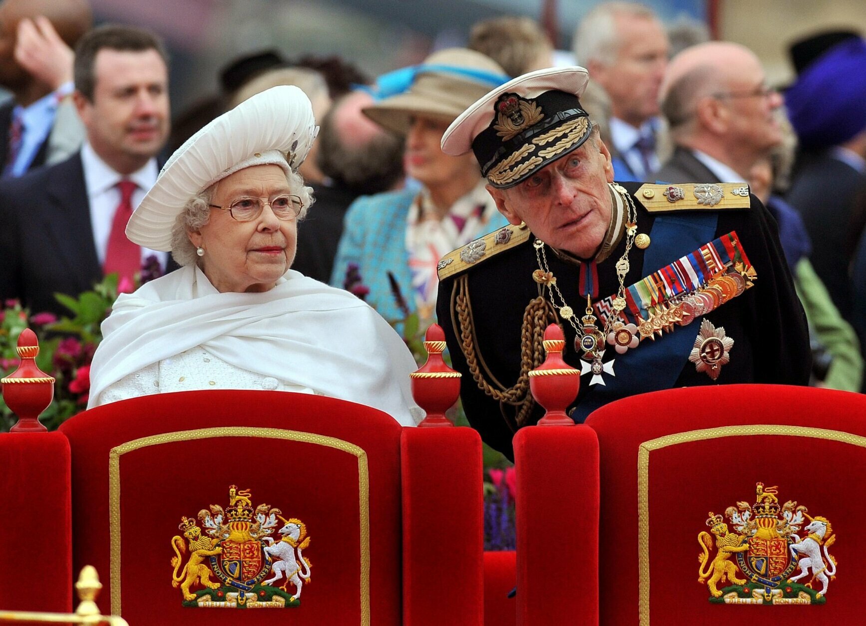 FILE - In this Sunday June 3, 2012 file photo, Britain's Queen Elizabeth II and her husband Prince Philip watches the proceedings from the royal barge during the Diamond Jubilee Pageant on the River Thames in London. Buckingham Palace says Prince Philip, husband of Queen Elizabeth II, has died aged 99.(AP Photo/John Stillwell, Pool, File)