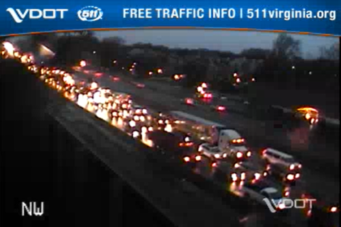 Police investigate stolen car on I-66; traffic backed up for miles