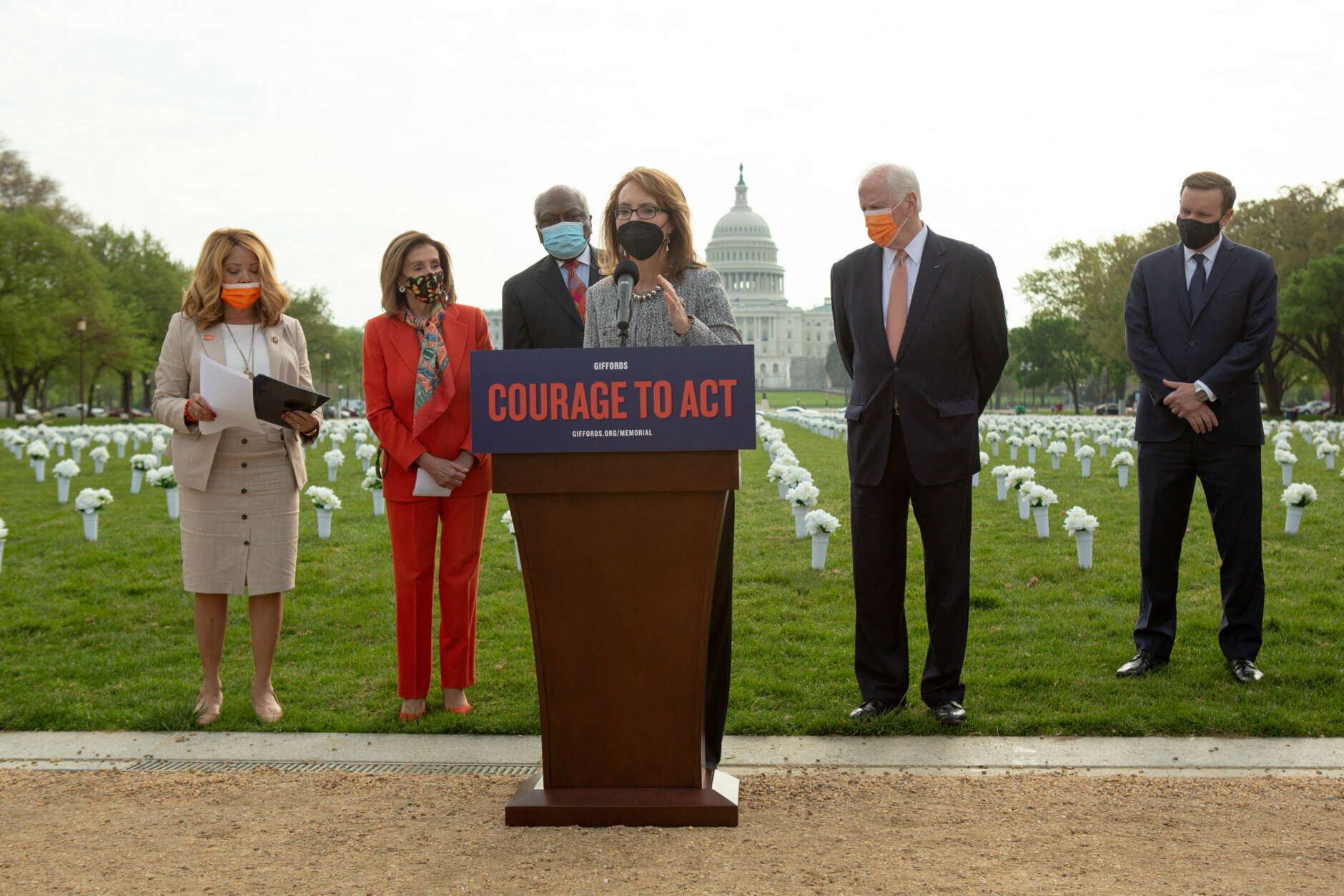 A press conference inaugurates the Gun Violence Memorial, a temporary installation consisting of 40,000 silk flowers, on the National Mall in Washington, D.C., April 14, 2021. (photo by Allison Shelley/Emic Films)