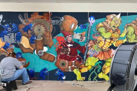 Mural turns Columbia grocery store into art attraction full of mythical creatures