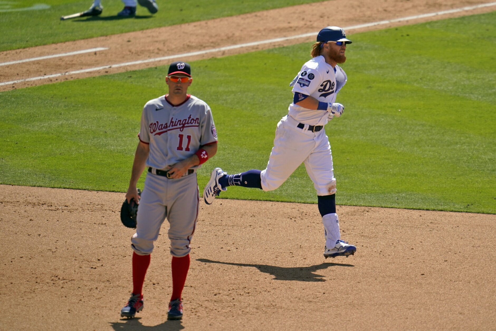 Los Angeles Dodgers' Justin Turner (21) stands at first base